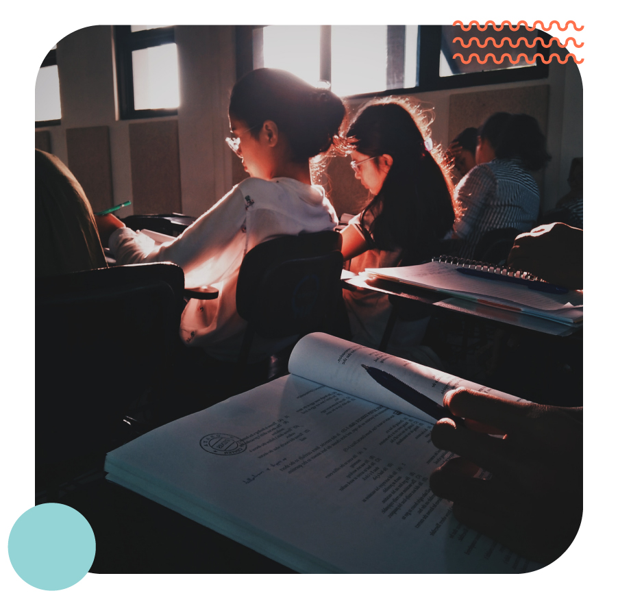 Students in a classroom at a beautiful sunset light